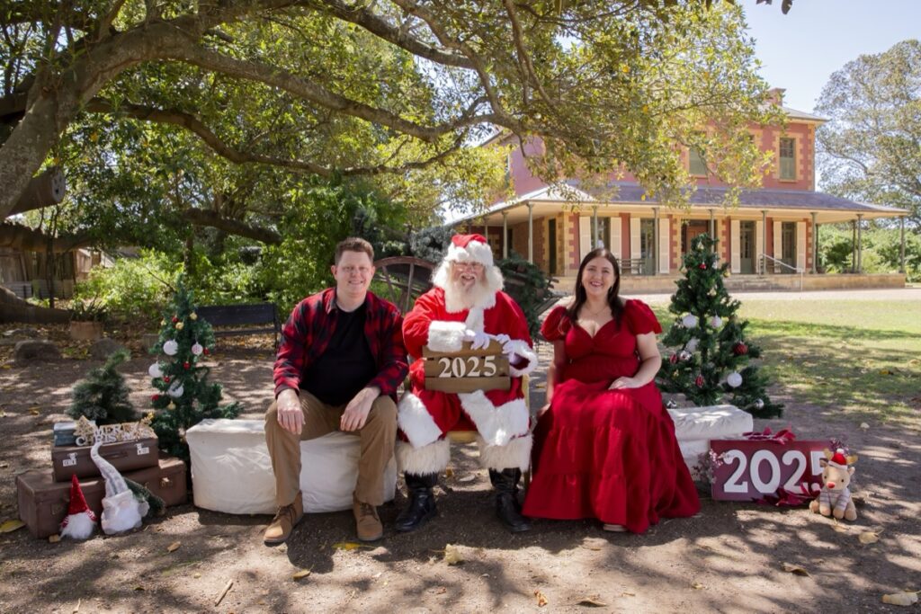 Family having Christmas photos taken with Santa at Tocal Homestead in the Hunter Valley